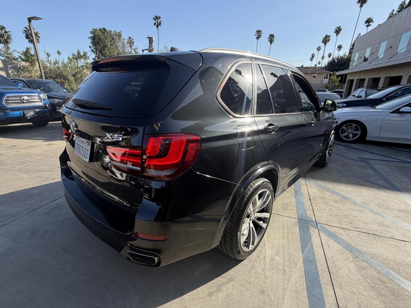 2016 Black /Black BMW X5 xDrive35i (5UXKR0C50G0) with an 3.0L L6 DOHC 24V engine, 8A transmission, located at 30 S. Berkeley Avenue, Pasadena, CA, 91107, (626) 248-7567, 34.145447, -118.109398 - Why the 2016 BMW X5 Stands Out The 2016 BMW X5 is a premium midsize SUV that delivers exceptional performance and luxury. With its black-on-black configuration, this X5 exudes elegance and power, making it perfect for any occasion. Whether you’re heading to work, chauffeuring the family, or embar - Photo#4