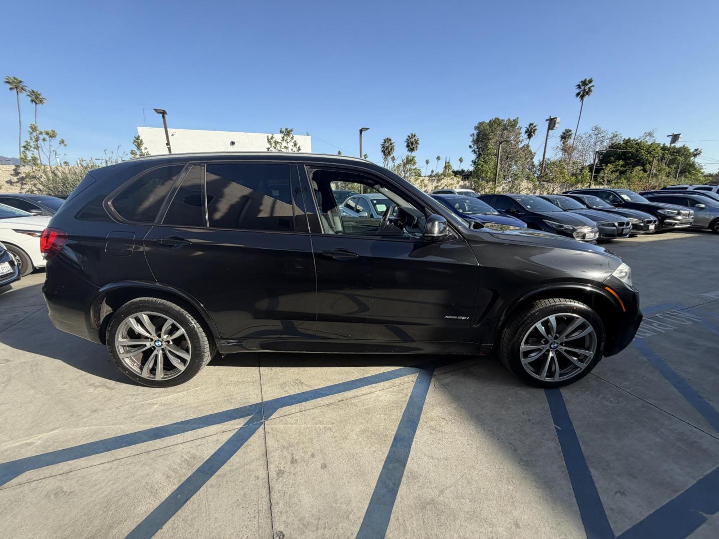 2016 Black /Black BMW X5 xDrive35i (5UXKR0C50G0) with an 3.0L L6 DOHC 24V engine, 8A transmission, located at 30 S. Berkeley Avenue, Pasadena, CA, 91107, (626) 248-7567, 34.145447, -118.109398 - Why the 2016 BMW X5 Stands Out The 2016 BMW X5 is a premium midsize SUV that delivers exceptional performance and luxury. With its black-on-black configuration, this X5 exudes elegance and power, making it perfect for any occasion. Whether you’re heading to work, chauffeuring the family, or embar - Photo#5
