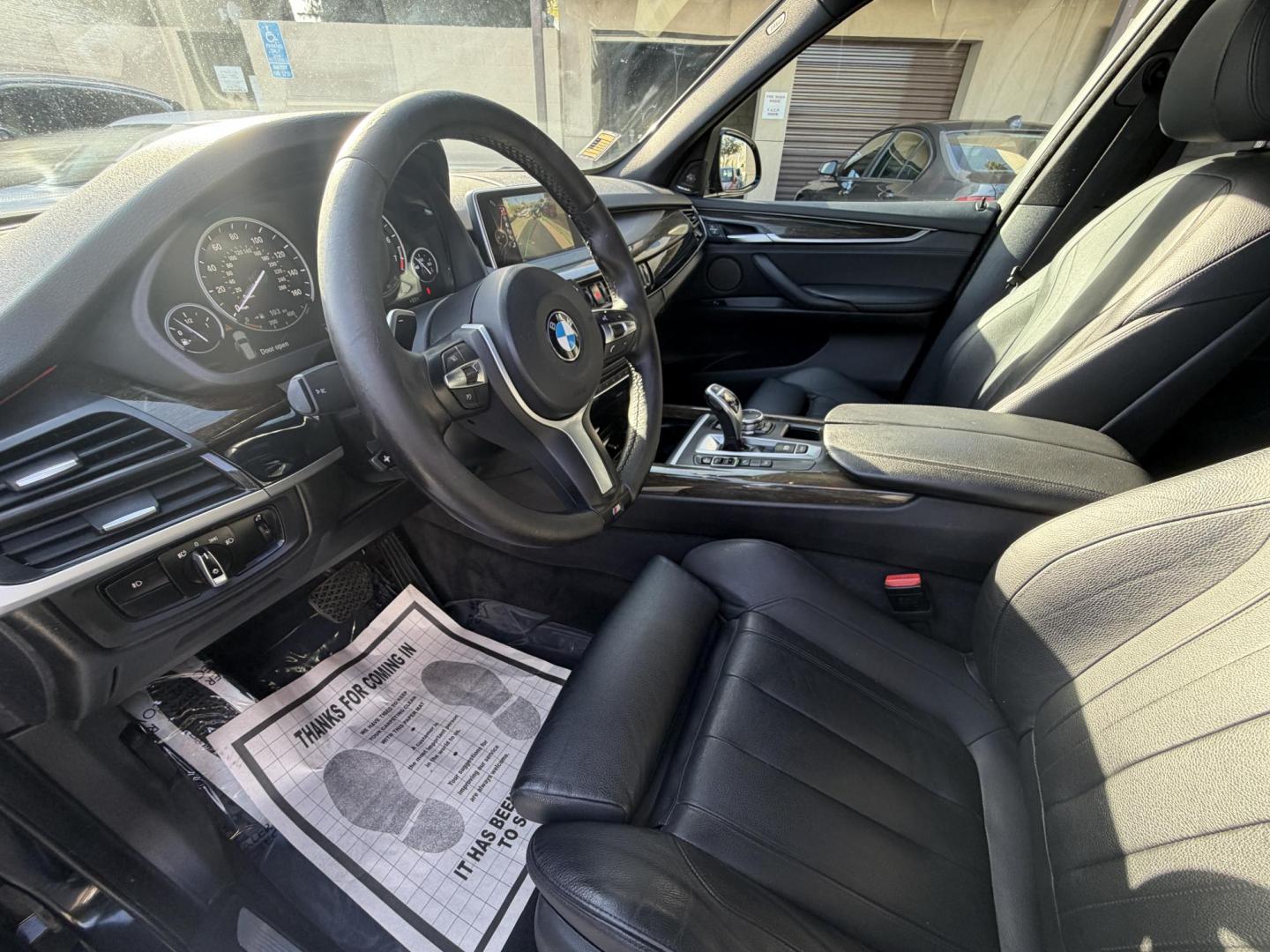 2016 Black /Black BMW X5 xDrive35i (5UXKR0C50G0) with an 3.0L L6 DOHC 24V engine, 8A transmission, located at 30 S. Berkeley Avenue, Pasadena, CA, 91107, (626) 248-7567, 34.145447, -118.109398 - Why the 2016 BMW X5 Stands Out The 2016 BMW X5 is a premium midsize SUV that delivers exceptional performance and luxury. With its black-on-black configuration, this X5 exudes elegance and power, making it perfect for any occasion. Whether you’re heading to work, chauffeuring the family, or embar - Photo#6