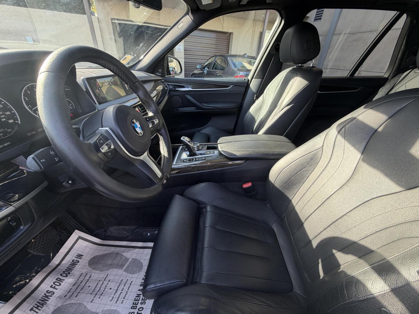 2016 Black /Black BMW X5 xDrive35i (5UXKR0C50G0) with an 3.0L L6 DOHC 24V engine, 8A transmission, located at 30 S. Berkeley Avenue, Pasadena, CA, 91107, (626) 248-7567, 34.145447, -118.109398 - Why the 2016 BMW X5 Stands Out The 2016 BMW X5 is a premium midsize SUV that delivers exceptional performance and luxury. With its black-on-black configuration, this X5 exudes elegance and power, making it perfect for any occasion. Whether you’re heading to work, chauffeuring the family, or embar - Photo#7