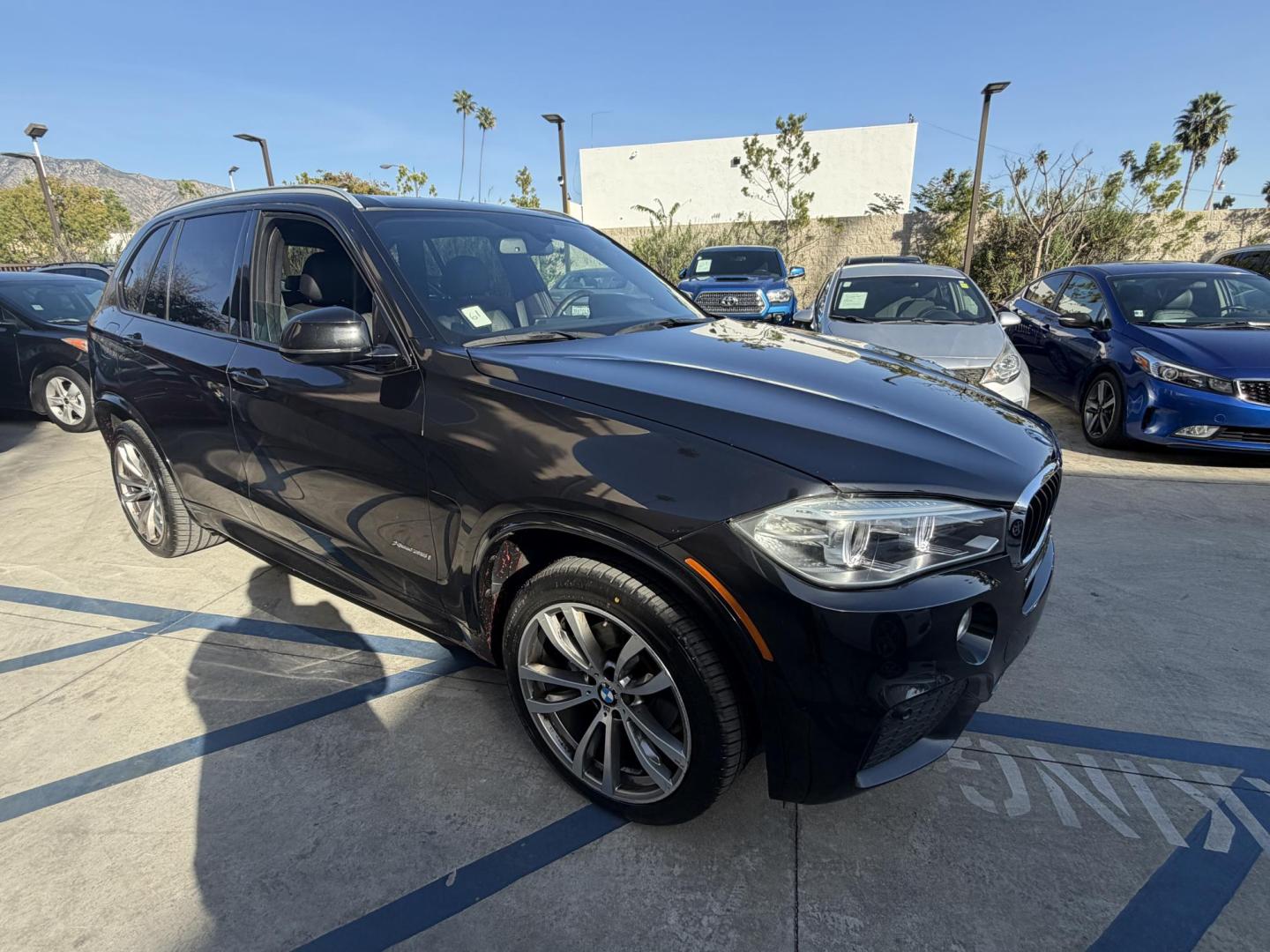 2016 Black /Black BMW X5 xDrive35i (5UXKR0C50G0) with an 3.0L L6 DOHC 24V engine, 8A transmission, located at 30 S. Berkeley Avenue, Pasadena, CA, 91107, (626) 248-7567, 34.145447, -118.109398 - Why the 2016 BMW X5 Stands Out The 2016 BMW X5 is a premium midsize SUV that delivers exceptional performance and luxury. With its black-on-black configuration, this X5 exudes elegance and power, making it perfect for any occasion. Whether you’re heading to work, chauffeuring the family, or embar - Photo#10