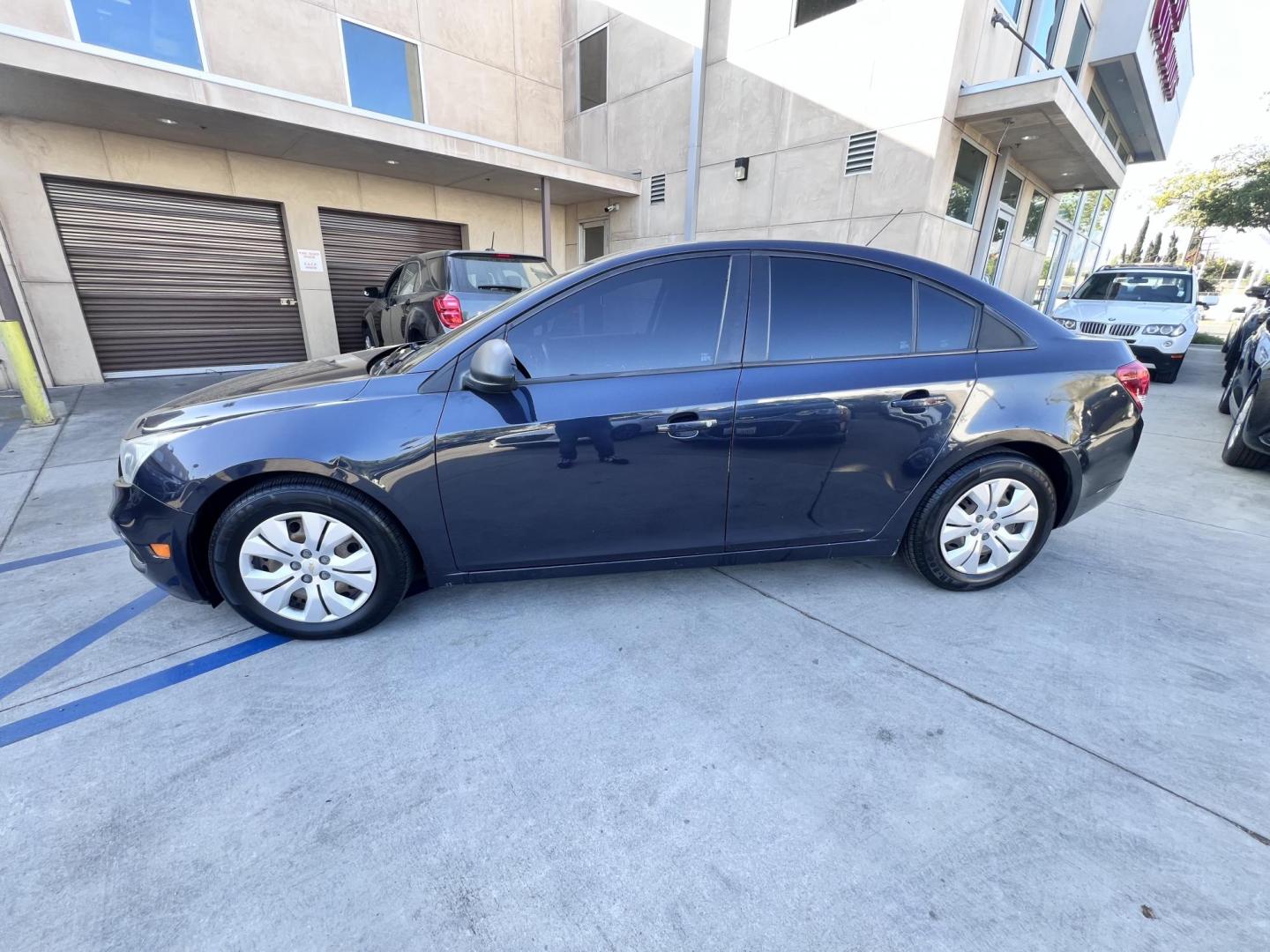 2016 BLUE /BLACK Chevrolet Cruze Limited LS Auto (1G1PC5SG6G7) with an 1.8L L4 DOHC 16V FFV engine, 6A transmission, located at 30 S. Berkeley Avenue, Pasadena, CA, 91107, (626) 248-7567, 34.145447, -118.109398 - 2016 Chevrolet Cruze – Buy Here Pay Here – $500 Down – Pasadena, CA If you’ve been searching for a reliable car with easy financing, your search ends here. This 2016 Chevrolet Cruze is available now at Crown City Motors in Pasadena, CA, with our signature Buy Here Pay Here financing. Whet - Photo#7