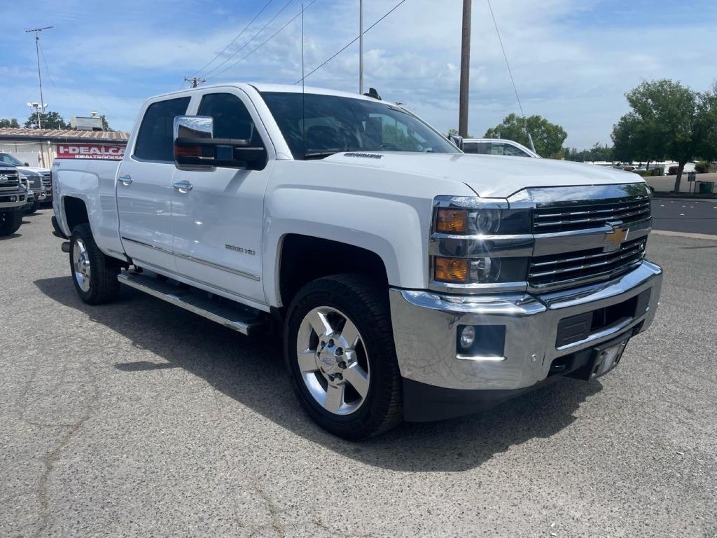2016 Summit White Chevrolet Silverado 2500HD LTZ (1GC1KWE80GF) with an 6.6L Duramax 6.6L Diesel Turbo V8 397hp 765ft. lbs. Common Rail Direct Injection engine, Allison 1000 6-Speed Shiftable Automatic transmission, located at 800 Riverside Ave, Roseville, CA, 95678, 916-773-4549 & Toll Free: 866-719-4393, 38.732265, -121.291039 - DURAMAX DIESEL CREW CAB 4X4 LTZ LOW MILES MOON ROOF ALLISON TRANSMISSION ONE OWNER - Photo#1