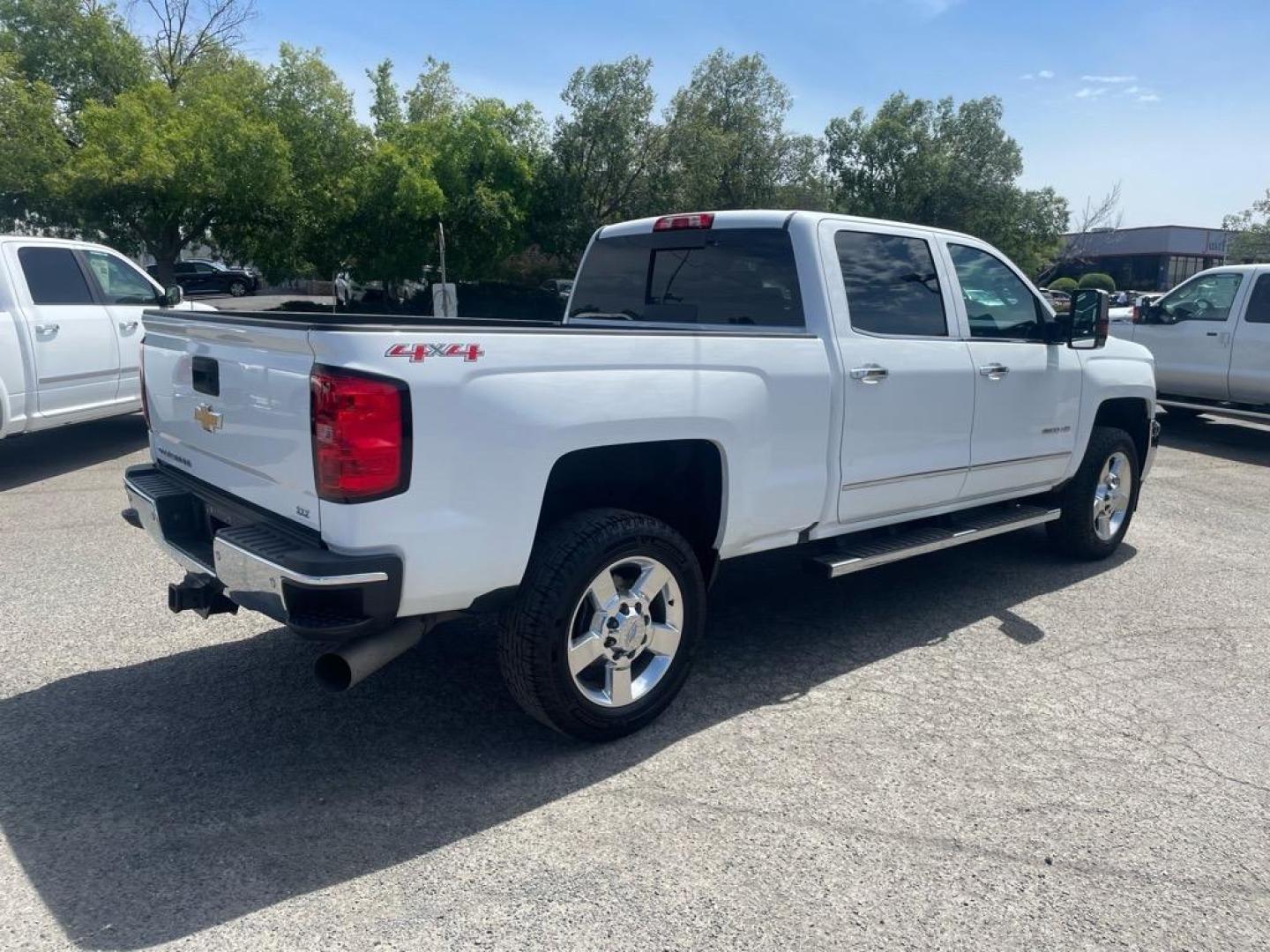 2016 Summit White Chevrolet Silverado 2500HD LTZ (1GC1KWE80GF) with an 6.6L Duramax 6.6L Diesel Turbo V8 397hp 765ft. lbs. Common Rail Direct Injection engine, Allison 1000 6-Speed Shiftable Automatic transmission, located at 800 Riverside Ave, Roseville, CA, 95678, 916-773-4549 & Toll Free: 866-719-4393, 38.732265, -121.291039 - DURAMAX DIESEL CREW CAB 4X4 LTZ LOW MILES MOON ROOF ALLISON TRANSMISSION ONE OWNER - Photo#4