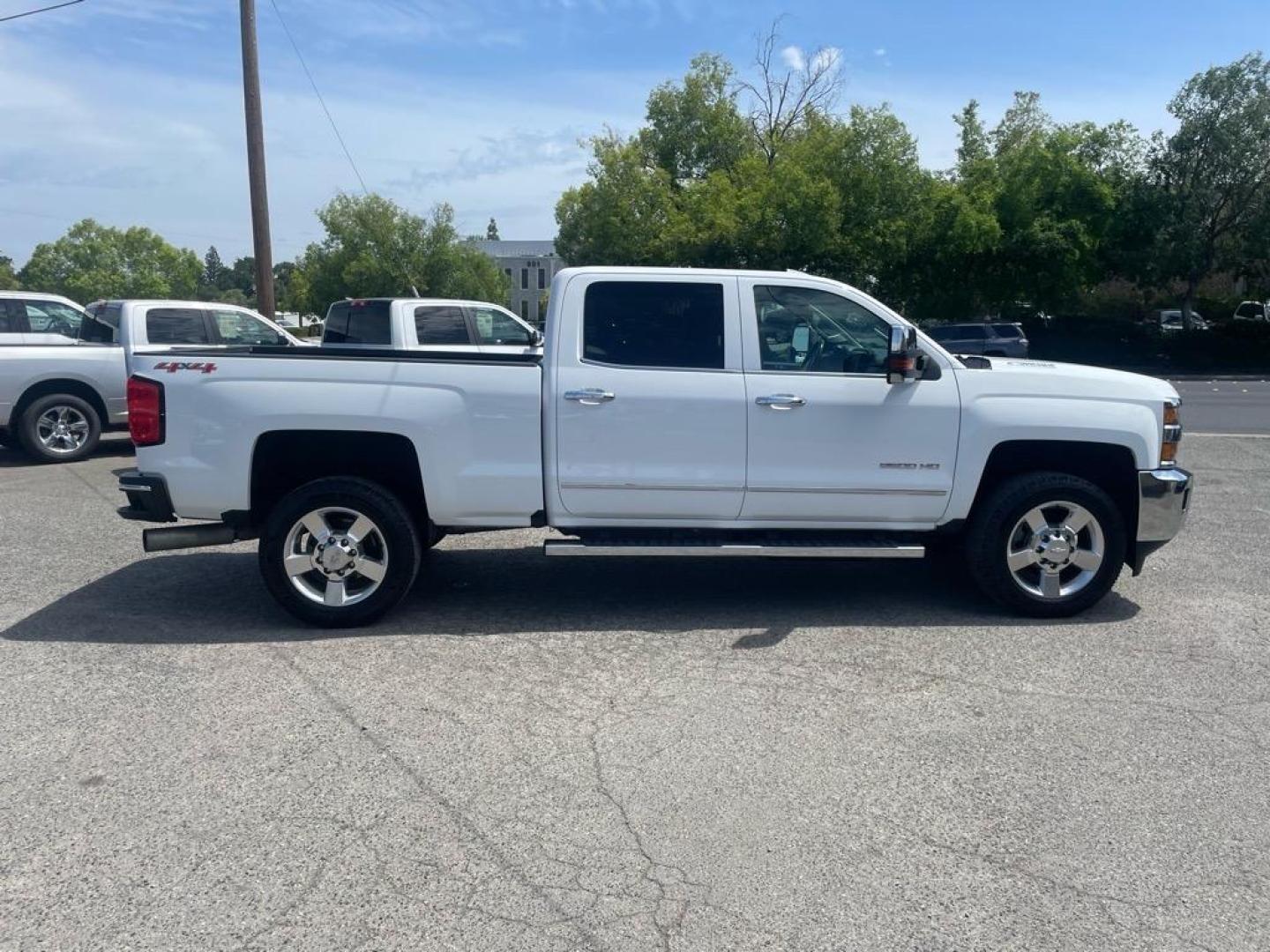 2016 Summit White Chevrolet Silverado 2500HD LTZ (1GC1KWE80GF) with an 6.6L Duramax 6.6L Diesel Turbo V8 397hp 765ft. lbs. Common Rail Direct Injection engine, Allison 1000 6-Speed Shiftable Automatic transmission, located at 800 Riverside Ave, Roseville, CA, 95678, 916-773-4549 & Toll Free: 866-719-4393, 38.732265, -121.291039 - DURAMAX DIESEL CREW CAB 4X4 LTZ LOW MILES MOON ROOF ALLISON TRANSMISSION ONE OWNER - Photo#6