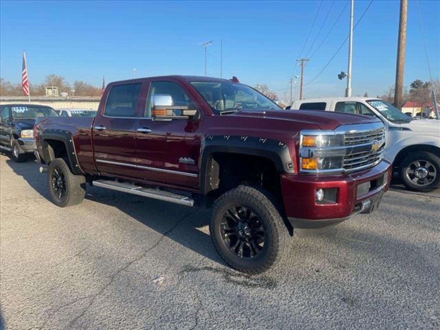 2016 Butte Red Metallic Chevrolet Silverado 2500HD High Country (1GC1KXE87GF) with an 6.6L Duramax 6.6L Diesel Turbo V8 397hp 765ft. lbs. Common Rail Direct Injection engine, Allison 1000 6-Speed Shiftable Automatic transmission, located at 800 Riverside Ave, Roseville, CA, 95678, 916-773-4549 & Toll Free: 866-719-4393, 38.732265, -121.291039 - DURAMAX DIESEL CREW CAB 4X4 HIGH COUNTY LIFTED ALLISON TRANSMISSION SERVICE RECORDS ON CLEAN CARFAX - Photo#1