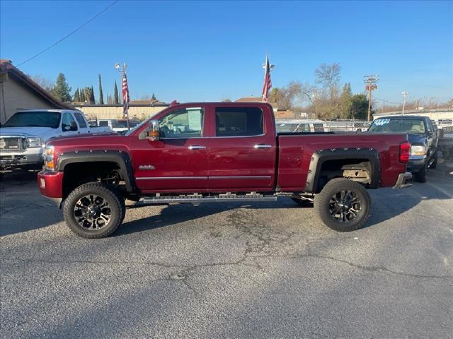 2016 Butte Red Metallic Chevrolet Silverado 2500HD High Country (1GC1KXE87GF) with an 6.6L Duramax 6.6L Diesel Turbo V8 397hp 765ft. lbs. Common Rail Direct Injection engine, Allison 1000 6-Speed Shiftable Automatic transmission, located at 800 Riverside Ave, Roseville, CA, 95678, 916-773-4549 & Toll Free: 866-719-4393, 38.732265, -121.291039 - DURAMAX DIESEL CREW CAB 4X4 HIGH COUNTY LIFTED ALLISON TRANSMISSION SERVICE RECORDS ON CLEAN CARFAX - Photo#6