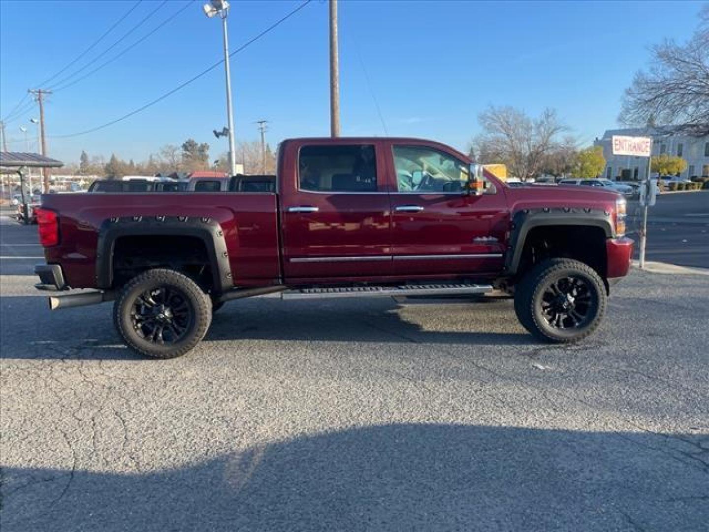2016 Butte Red Metallic Chevrolet Silverado 2500HD High Country (1GC1KXE87GF) with an 6.6L Duramax 6.6L Diesel Turbo V8 397hp 765ft. lbs. Common Rail Direct Injection engine, Allison 1000 6-Speed Shiftable Automatic transmission, located at 800 Riverside Ave, Roseville, CA, 95678, 916-773-4549 & Toll Free: 866-719-4393, 38.732265, -121.291039 - DURAMAX DIESEL CREW CAB 4X4 HIGH COUNTY LIFTED ALLISON TRANSMISSION SERVICE RECORDS ON CLEAN CARFAX - Photo#7