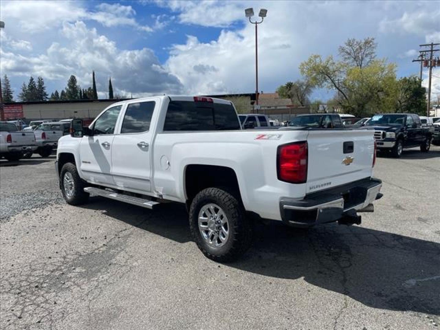 2016 Summit White Chevrolet Silverado 2500HD LTZ (1GC1KWE84GF) with an 6.6L Duramax 6.6L Diesel Turbo V8 397hp 765ft. lbs. Common Rail Direct Injection engine, Allison 1000 6-Speed Shiftable Automatic transmission, located at 800 Riverside Ave, Roseville, CA, 95678, 916-773-4549 & Toll Free: 866-719-4393, 38.732265, -121.291039 - DURAMAX DIESEL CREW CAB 4X4 Z71 LTZ SERVICE RECORDS ONE OWNER CLEAN CARFAX - Photo#2