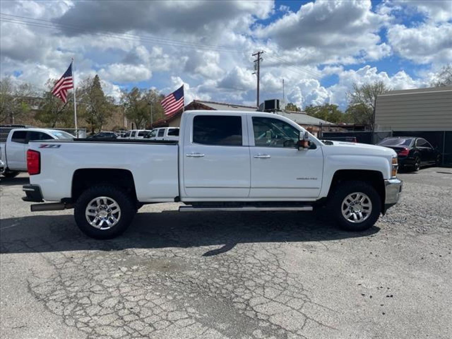 2016 Summit White Chevrolet Silverado 2500HD LTZ (1GC1KWE84GF) with an 6.6L Duramax 6.6L Diesel Turbo V8 397hp 765ft. lbs. Common Rail Direct Injection engine, Allison 1000 6-Speed Shiftable Automatic transmission, located at 800 Riverside Ave, Roseville, CA, 95678, 916-773-4549 & Toll Free: 866-719-4393, 38.732265, -121.291039 - DURAMAX DIESEL CREW CAB 4X4 Z71 LTZ SERVICE RECORDS ONE OWNER CLEAN CARFAX - Photo#5