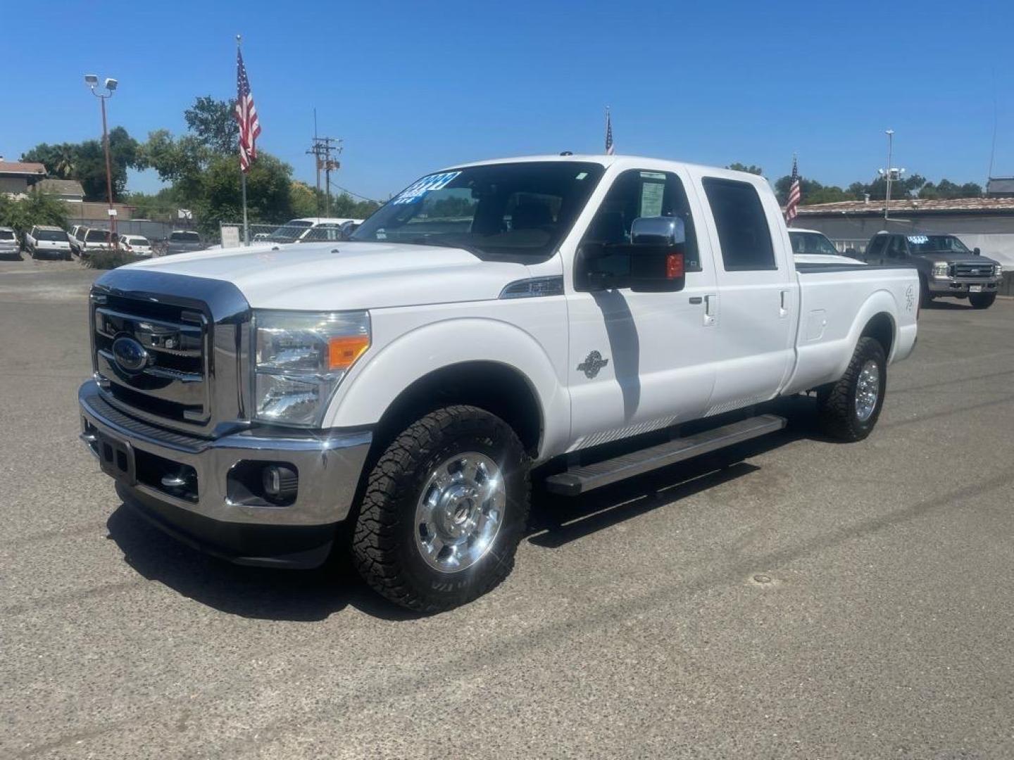 2016 Oxford White Ford F-250 Super Duty Lariat (1FT7W2BT4GE) with an 6.7L Power Stroke 6.7L Biodiesel Turbo V8 440hp 860ft. lbs. Common Rail Direct Injection engine, 6-Speed Shiftable Automatic transmission, located at 800 Riverside Ave, Roseville, CA, 95678, 916-773-4549 & Toll Free: 866-719-4393, 38.732265, -121.291039 - DIESEL CREW CAB 4X4 LARIAT MOON ROOF ONE OWNER SERVICE RECORDS ON CLEAN CARFAX - Photo#0