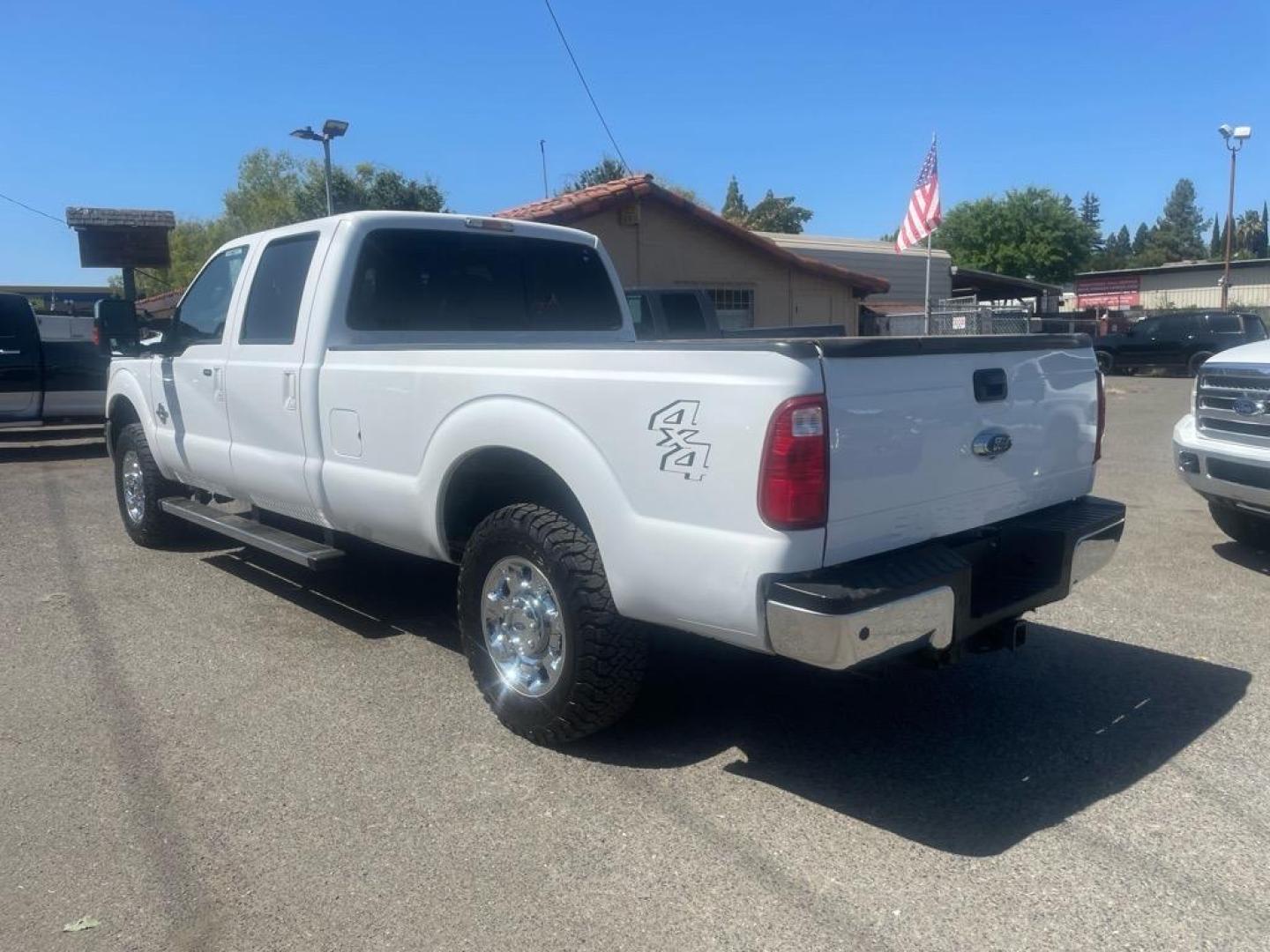 2016 Oxford White Ford F-250 Super Duty Lariat (1FT7W2BT4GE) with an 6.7L Power Stroke 6.7L Biodiesel Turbo V8 440hp 860ft. lbs. Common Rail Direct Injection engine, 6-Speed Shiftable Automatic transmission, located at 800 Riverside Ave, Roseville, CA, 95678, 916-773-4549 & Toll Free: 866-719-4393, 38.732265, -121.291039 - DIESEL CREW CAB 4X4 LARIAT MOON ROOF ONE OWNER SERVICE RECORDS ON CLEAN CARFAX - Photo#2