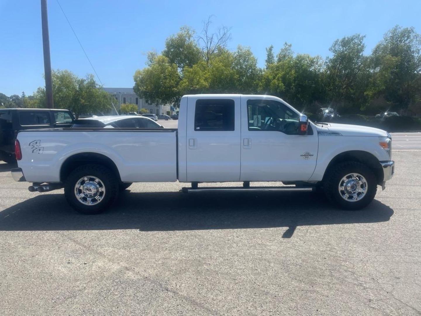2016 Oxford White Ford F-250 Super Duty Lariat (1FT7W2BT4GE) with an 6.7L Power Stroke 6.7L Biodiesel Turbo V8 440hp 860ft. lbs. Common Rail Direct Injection engine, 6-Speed Shiftable Automatic transmission, located at 800 Riverside Ave, Roseville, CA, 95678, 916-773-4549 & Toll Free: 866-719-4393, 38.732265, -121.291039 - DIESEL CREW CAB 4X4 LARIAT MOON ROOF ONE OWNER SERVICE RECORDS ON CLEAN CARFAX - Photo#5