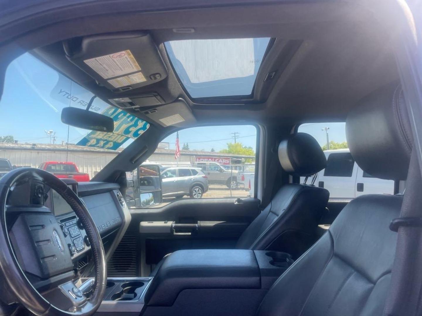 2016 Oxford White Ford F-250 Super Duty Lariat (1FT7W2BT4GE) with an 6.7L Power Stroke 6.7L Biodiesel Turbo V8 440hp 860ft. lbs. Common Rail Direct Injection engine, 6-Speed Shiftable Automatic transmission, located at 800 Riverside Ave, Roseville, CA, 95678, 916-773-4549 & Toll Free: 866-719-4393, 38.732265, -121.291039 - DIESEL CREW CAB 4X4 LARIAT MOON ROOF ONE OWNER SERVICE RECORDS ON CLEAN CARFAX - Photo#9