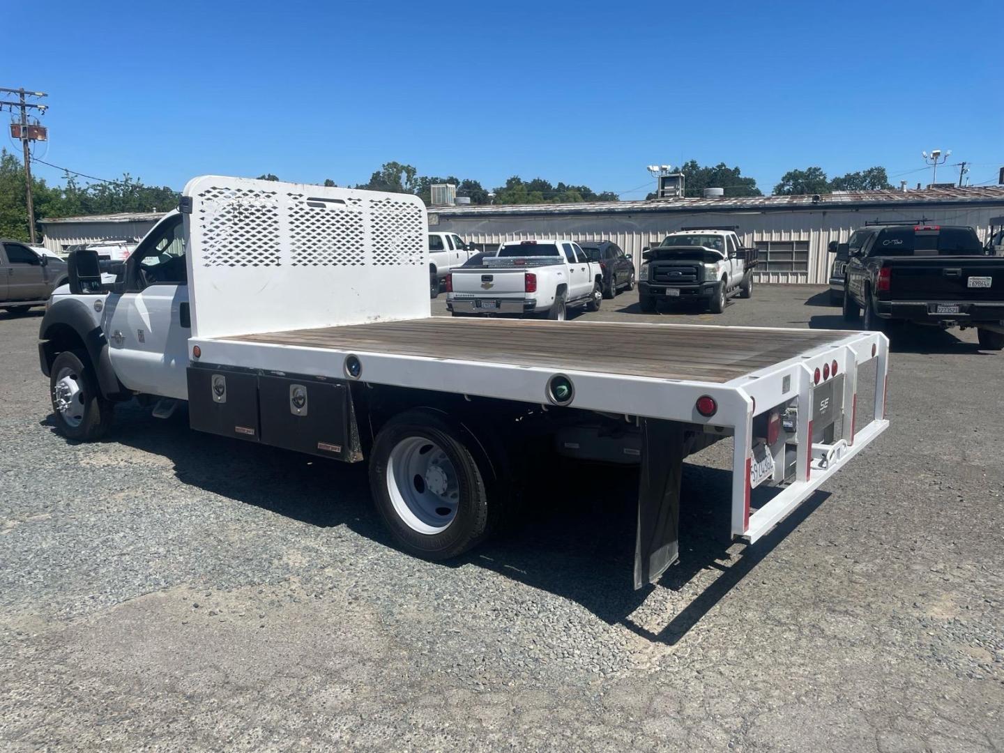 2016 White Ford F-550 Super Duty Chassis XL Regular Cab 165 RWD (1FDUF5GT3GE) with an 8 Cylinder Other engine, 6-Speed Automatic transmission, located at 800 Riverside Ave, Roseville, CA, 95678, 916-773-4549 & Toll Free: 866-719-4393, 38.732265, -121.291039 - DIESEL FLATBED- Photo#2