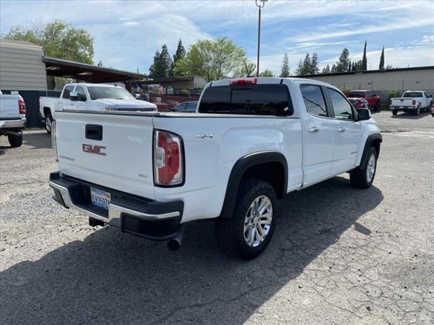 2016 Summit White GMC Canyon SLT (1GTP6DE17G1) with an 2.8L Duramax 2.8L Diesel Turbo I4 181hp 369ft. lbs. Common Rail Direct Injection engine, 6-Speed Shiftable Automatic transmission, located at 800 Riverside Ave, Roseville, CA, 95678, 916-773-4549 & Toll Free: 866-719-4393, 38.732265, -121.291039 - DURAMAX DIESEL CREW CAB 4X4 SLT - Photo#4