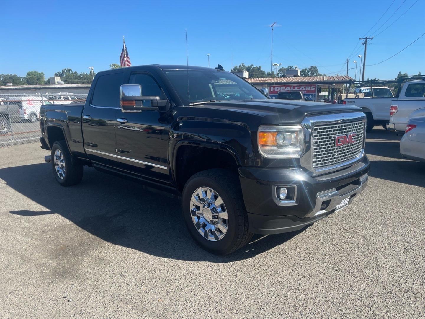 2016 Onyx Black GMC Sierra 2500HD Denali (1GT12UE83GF) with an 6.6L Duramax 6.6L Diesel Turbo V8 397hp 765ft. lbs. Common Rail Direct Injection engine, Allison 1000 6-Speed Shiftable Automatic transmission, located at 800 Riverside Ave, Roseville, CA, 95678, 916-773-4549 & Toll Free: 866-719-4393, 38.732265, -121.291039 - DURAMAX DIESEL CREW CAB 4X4 DENALI CP3 FUEL PUMP CONVERSION- Photo#1