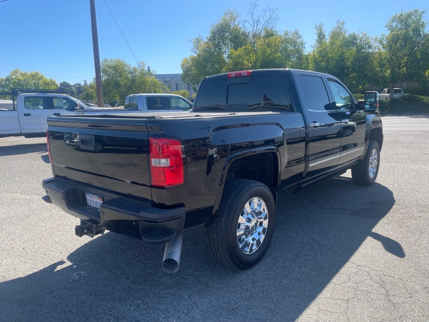 2016 Onyx Black GMC Sierra 2500HD Denali (1GT12UE83GF) with an 6.6L Duramax 6.6L Diesel Turbo V8 397hp 765ft. lbs. Common Rail Direct Injection engine, Allison 1000 6-Speed Shiftable Automatic transmission, located at 800 Riverside Ave, Roseville, CA, 95678, 916-773-4549 & Toll Free: 866-719-4393, 38.732265, -121.291039 - DURAMAX DIESEL CREW CAB 4X4 DENALI CP3 FUEL PUMP CONVERSION- Photo#3