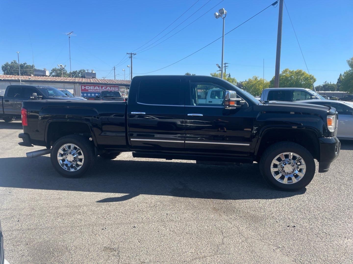 2016 Onyx Black GMC Sierra 2500HD Denali (1GT12UE83GF) with an 6.6L Duramax 6.6L Diesel Turbo V8 397hp 765ft. lbs. Common Rail Direct Injection engine, Allison 1000 6-Speed Shiftable Automatic transmission, located at 800 Riverside Ave, Roseville, CA, 95678, 916-773-4549 & Toll Free: 866-719-4393, 38.732265, -121.291039 - DURAMAX DIESEL CREW CAB 4X4 DENALI CP3 FUEL PUMP CONVERSION- Photo#5
