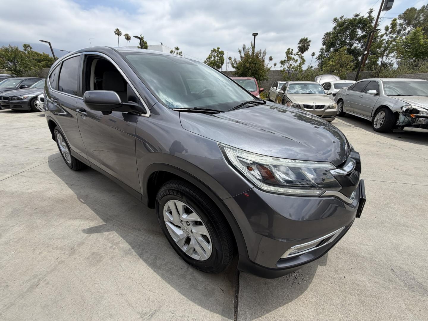 2016 Urban Titanium Metallic: /Gray Honda CR-V EX 2WD (3CZRM3H50GG) with an 2.4L L4 DOHC 16V engine, CVT transmission, located at 30 S. Berkeley Avenue, Pasadena, CA, 91107, (626) 248-7567, 34.145447, -118.109398 - ? 2016 Honda CR-V EX – Reliable, Fuel Efficient SUV – Easy Financing Available at Crown City Motors Looking for a dependable SUV in Pasadena with low maintenance costs, great fuel economy, and flexible financing options? This 2016 Honda CR-V EX (VIN: 3CZRM3H50GG721884) is one of the most trus - Photo#2