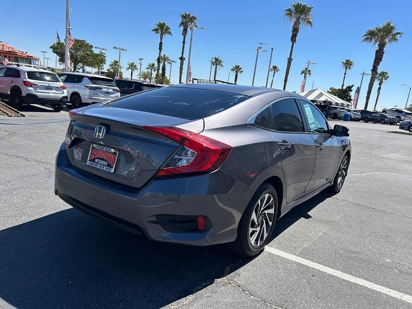 2016 Gray Honda Civic Sedan (19XFC2F79GE) with an 4-Cyl i-VTEC 2.0 Liter engine, Automatic CVT transmission, located at 412 Auto Vista Drive, Palmdale, 93551, (661) 945-0620, 34.592636, -118.136681- Photo#1