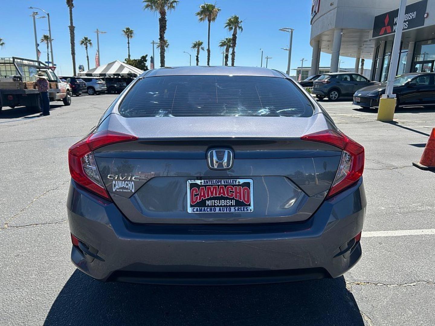 2016 Gray Honda Civic Sedan (19XFC2F79GE) with an 4-Cyl i-VTEC 2.0 Liter engine, Automatic CVT transmission, located at 412 Auto Vista Drive, Palmdale, 93551, (661) 945-0620, 34.592636, -118.136681- Photo#2