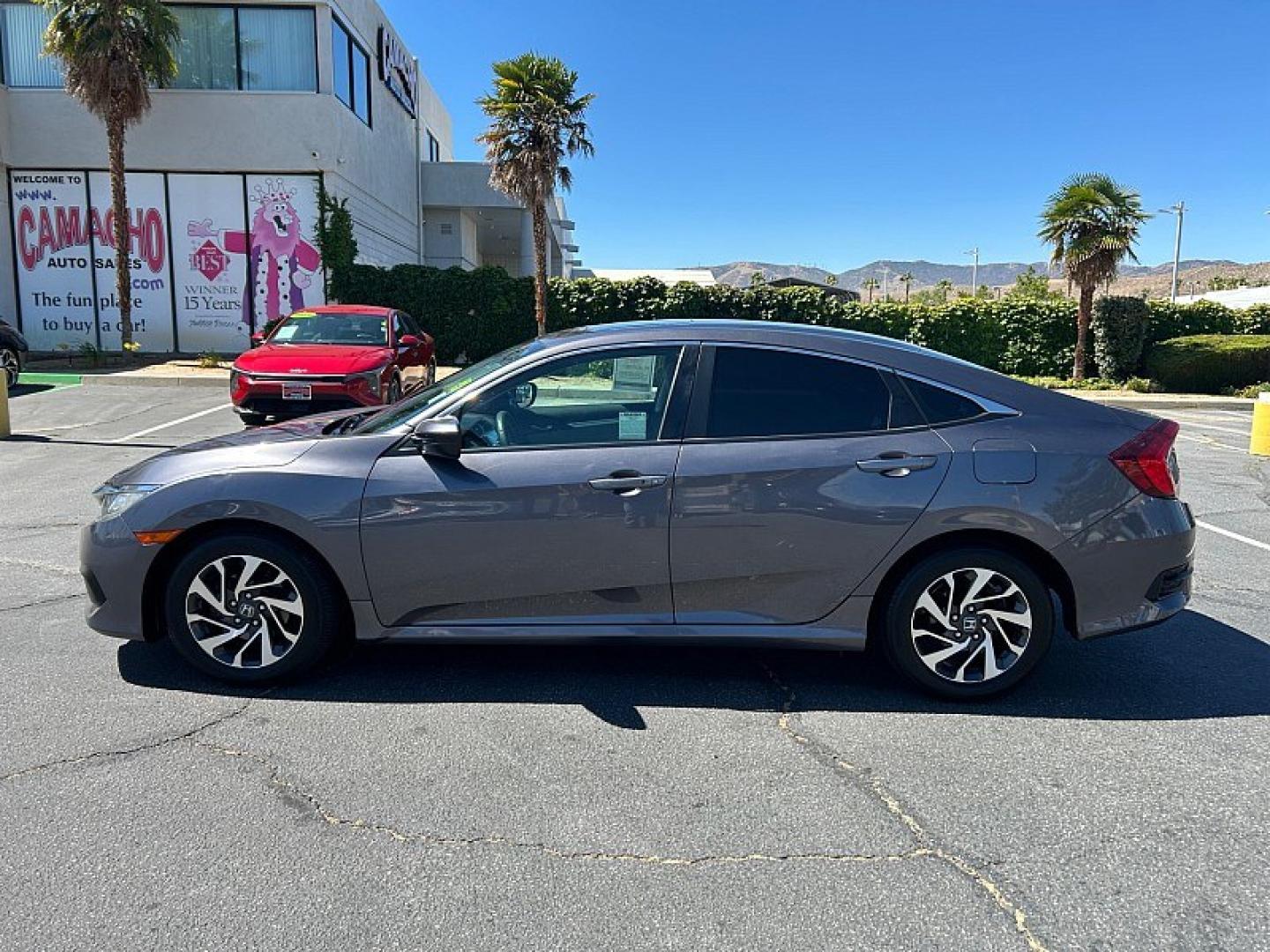 2016 Gray Honda Civic Sedan (19XFC2F79GE) with an 4-Cyl i-VTEC 2.0 Liter engine, Automatic CVT transmission, located at 412 Auto Vista Drive, Palmdale, 93551, (661) 945-0620, 34.592636, -118.136681- Photo#4
