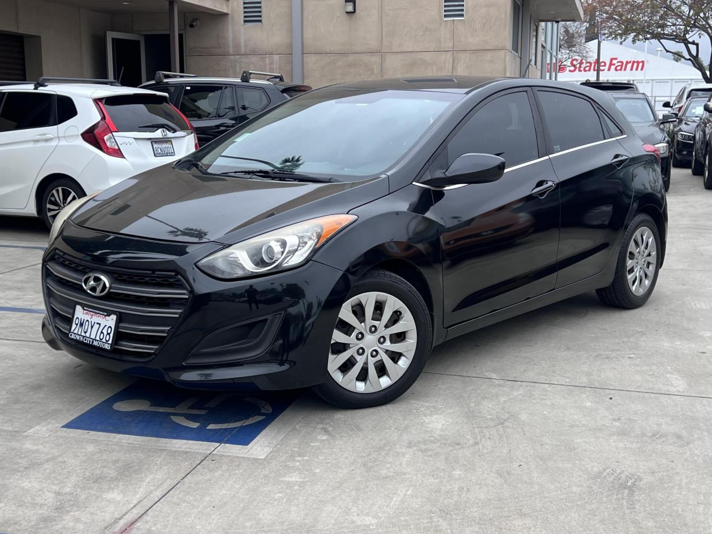 2016 Black Hyundai Elantra GT A/T (KMHD35LHXGU) with an 2.0L L4 16V DOHC engine, 6A transmission, located at 30 S. Berkeley Avenue, Pasadena, CA, 91107, (626) 248-7567, 34.145447, -118.109398 - Are you looking for a stylish and reliable used car, but have bad credit? Look no further than the 2016 Hyundai Elantra GT A/T! This popular car is available at our BHPH dealership in Pasadena, CA, and we offer bad credit auto loans to make it easy for you to get the car you need. The Elantra GT - Photo#0