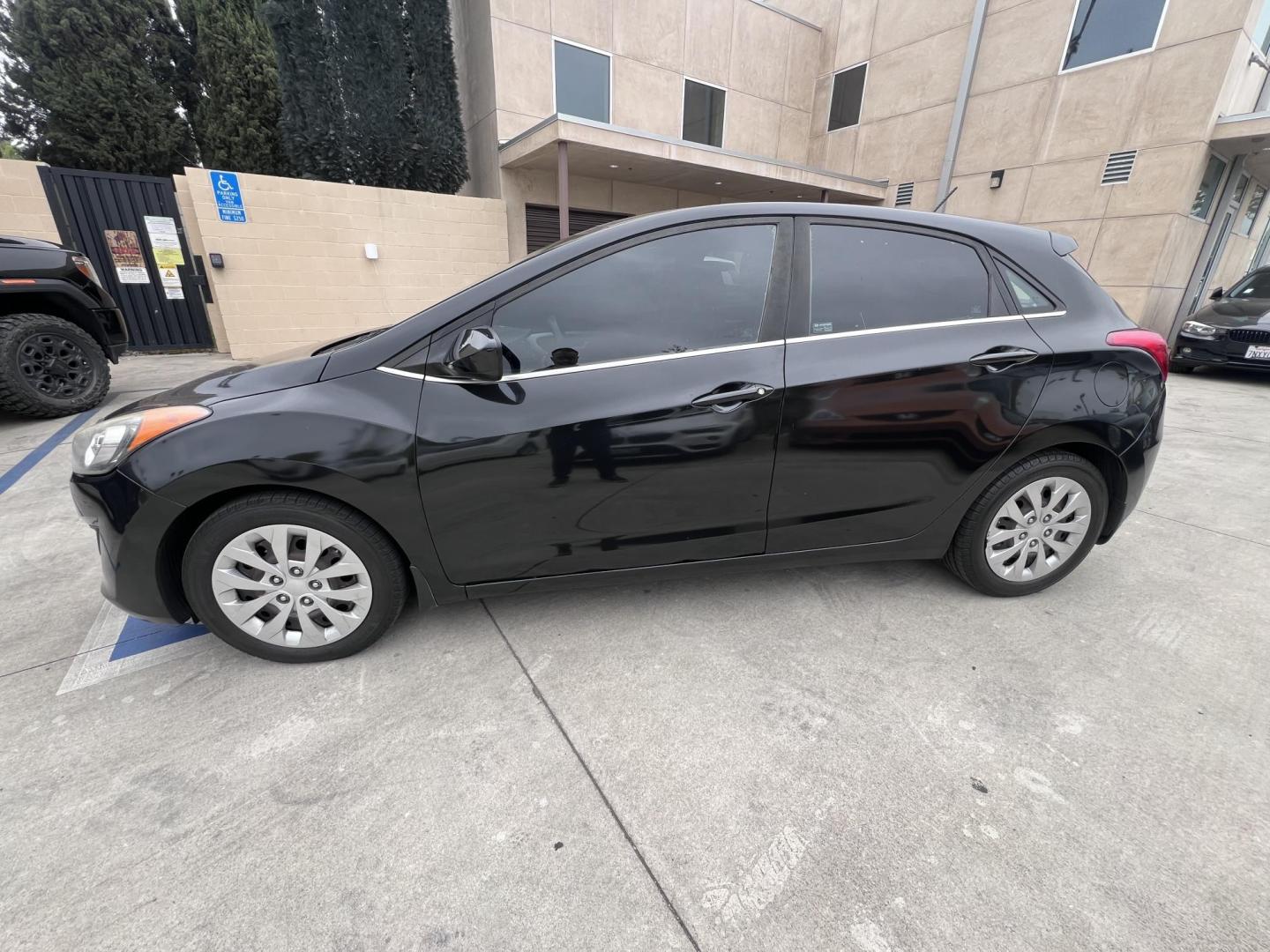 2016 Black Hyundai Elantra GT A/T (KMHD35LHXGU) with an 2.0L L4 16V DOHC engine, 6A transmission, located at 30 S. Berkeley Avenue, Pasadena, CA, 91107, (626) 248-7567, 34.145447, -118.109398 - Are you looking for a stylish and reliable used car, but have bad credit? Look no further than the 2016 Hyundai Elantra GT A/T! This popular car is available at our BHPH dealership in Pasadena, CA, and we offer bad credit auto loans to make it easy for you to get the car you need. The Elantra GT - Photo#1