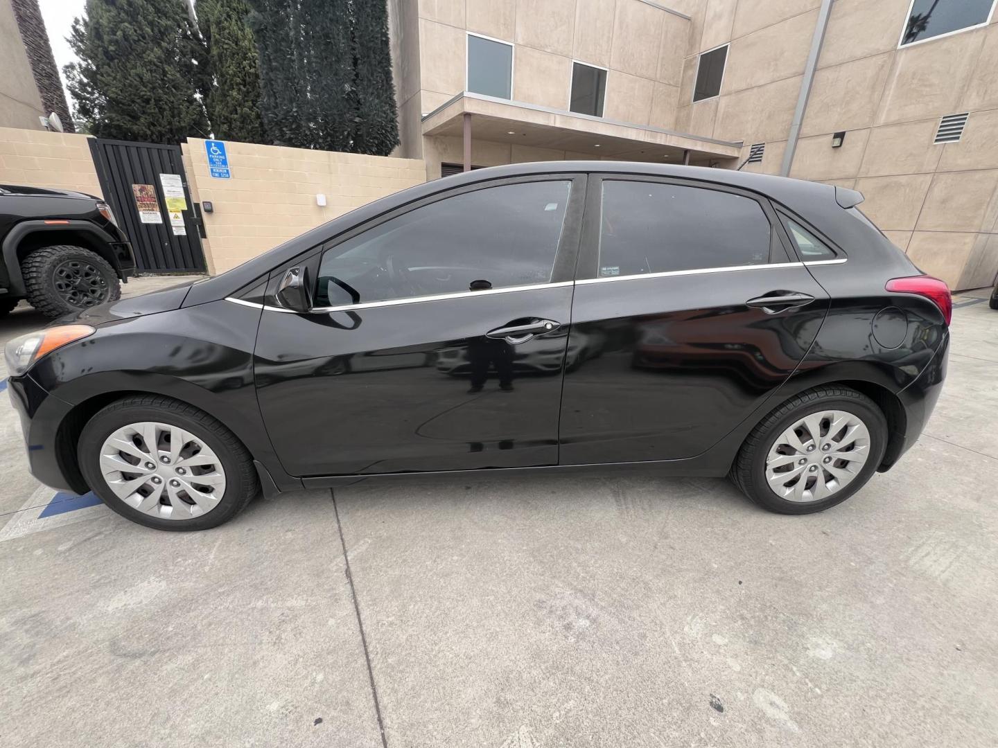 2016 Black Hyundai Elantra GT A/T (KMHD35LHXGU) with an 2.0L L4 16V DOHC engine, 6A transmission, located at 30 S. Berkeley Avenue, Pasadena, CA, 91107, (626) 248-7567, 34.145447, -118.109398 - Are you looking for a stylish and reliable used car, but have bad credit? Look no further than the 2016 Hyundai Elantra GT A/T! This popular car is available at our BHPH dealership in Pasadena, CA, and we offer bad credit auto loans to make it easy for you to get the car you need. The Elantra GT - Photo#2