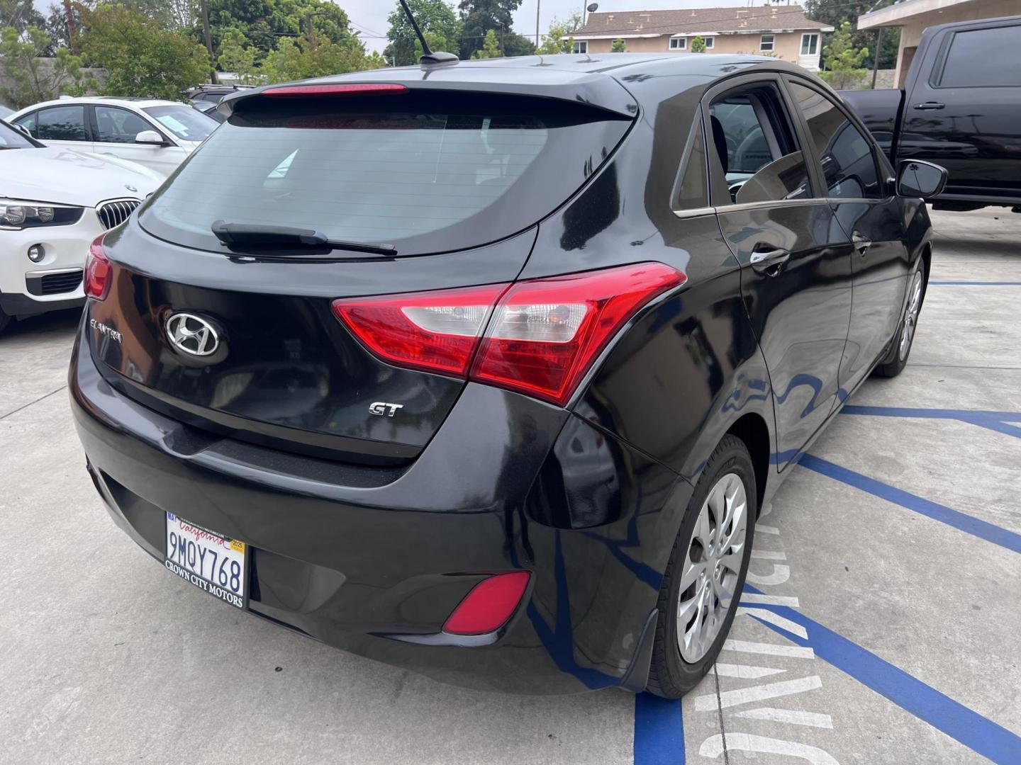 2016 Black Hyundai Elantra GT A/T (KMHD35LHXGU) with an 2.0L L4 16V DOHC engine, 6A transmission, located at 30 S. Berkeley Avenue, Pasadena, CA, 91107, (626) 248-7567, 34.145447, -118.109398 - Are you looking for a stylish and reliable used car, but have bad credit? Look no further than the 2016 Hyundai Elantra GT A/T! This popular car is available at our BHPH dealership in Pasadena, CA, and we offer bad credit auto loans to make it easy for you to get the car you need. The Elantra GT - Photo#5