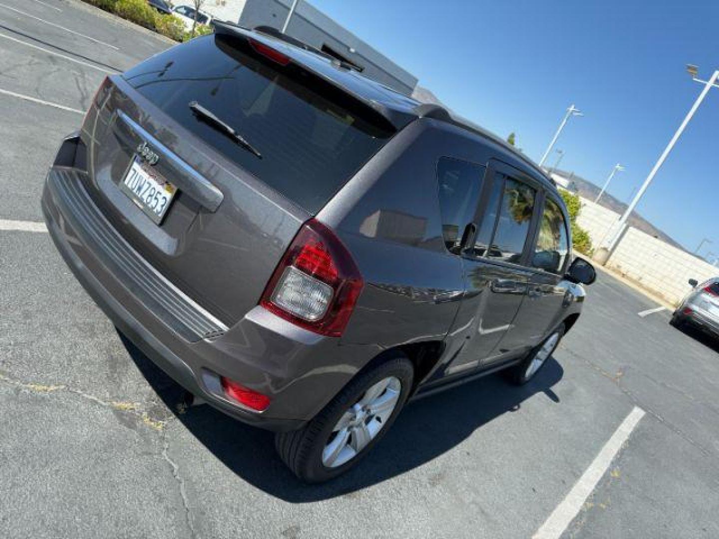 2016 GRAY Jeep Compass (1C4NJCBA5GD) with an 4-Cyl 2.0 Liter engine, Automatic transmission, located at 412 Auto Vista Drive, Palmdale, 93551, (661) 945-0620, 34.592636, -118.136681 - Photo#0