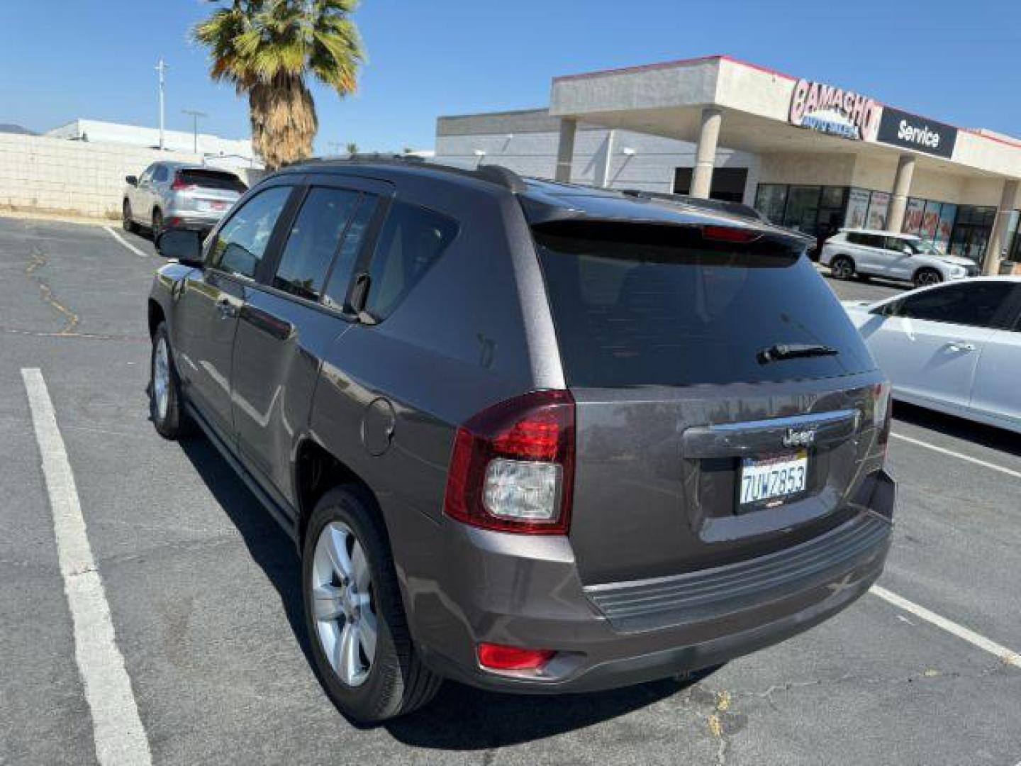 2016 GRAY Jeep Compass (1C4NJCBA5GD) with an 4-Cyl 2.0 Liter engine, Automatic transmission, located at 412 Auto Vista Drive, Palmdale, 93551, (661) 945-0620, 34.592636, -118.136681 - Photo#1