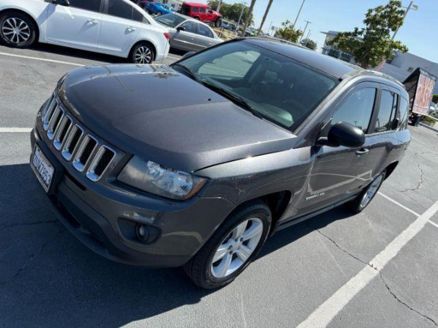 2016 GRAY Jeep Compass (1C4NJCBA5GD) with an 4-Cyl 2.0 Liter engine, Automatic transmission, located at 412 Auto Vista Drive, Palmdale, 93551, (661) 945-0620, 34.592636, -118.136681 - Photo#2