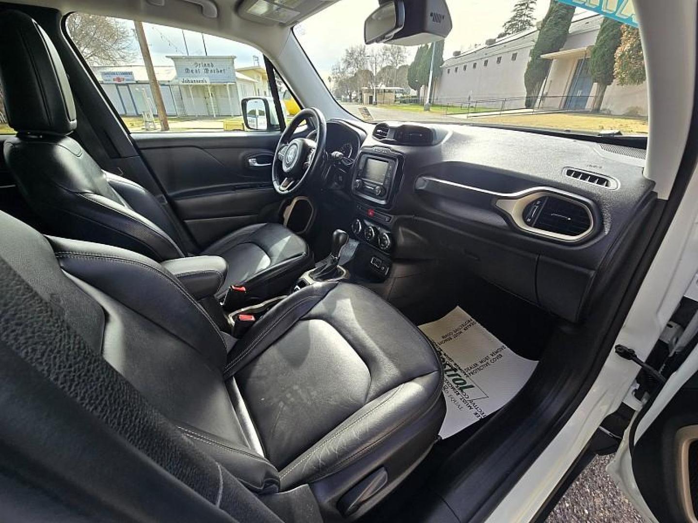 2016 WHITE Jeep Renegade (ZACCJADTXGP) with an 4-Cyl MultiAir 2.4L engine, Automatic 9-Spd transmission, located at 246 E Walker St., Orland, 95963, (530) 865-5800, 39.747589, -122.178398 - Photo#16