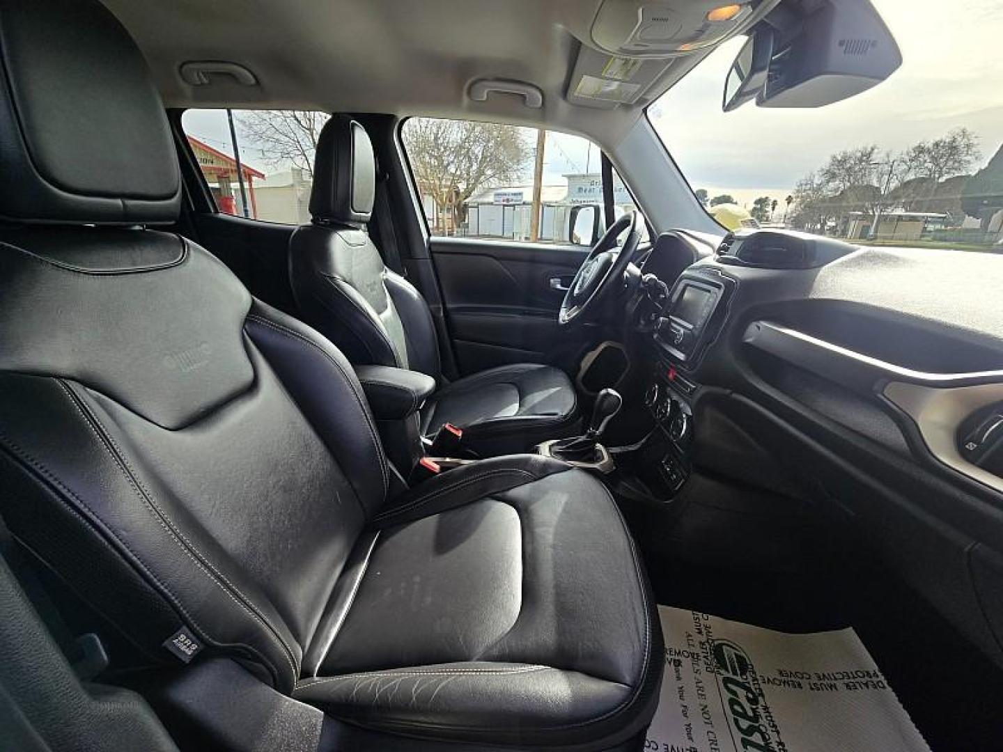 2016 WHITE Jeep Renegade (ZACCJADTXGP) with an 4-Cyl MultiAir 2.4L engine, Automatic 9-Spd transmission, located at 246 E Walker St., Orland, 95963, (530) 865-5800, 39.747589, -122.178398 - Photo#17