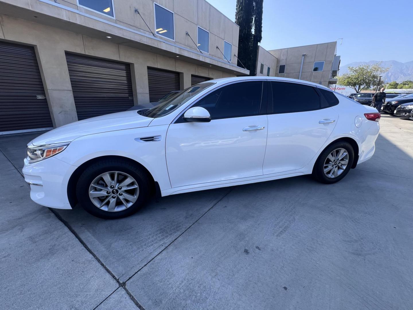 2016 Kia Optima LX (KNAGT4L31G5) with an 2.4L L4 DOHC 16V engine, 6A transmission, located at 30 S. Berkeley Avenue, Pasadena, CA, 91107, (626) 248-7567, 34.145447, -118.109398 - The vehicle looks and drives well,! alloy wheels! This vehicle comes with a dealer 30 day / 1,000 Mile Warranty ( call us for details) and with Options up to 5 years / 100,000 Mile Warranty. Bad credit? We can help! We are the bank. Buy with confidence! All of our cars are thoroughly inspected and r - Photo#1