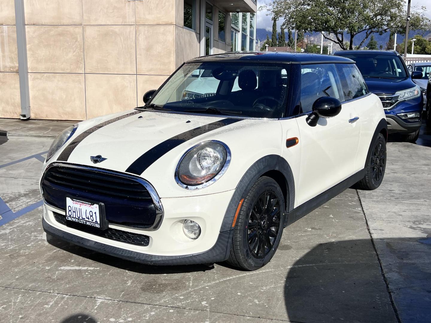 2016 White /Black Mini Cooper 3-Door (WMWXP5C59G3) with an 1.6L L4 DOHC 16V TURBO engine, located at 30 S. Berkeley Avenue, Pasadena, CA, 91107, (626) 248-7567, 34.145447, -118.109398 - 2016 MINI Cooper Hardtop 4-Door – Only 56K Miles – Buy Here Pay Here Pasadena Take home style, fun, and efficiency with this 2016 MINI Cooper 4-Door Hardtop (VIN WMWXP5C59G3B77329), showing only 56,000 original miles. This clean, compact hatchback blends European design with affordability and - Photo#0