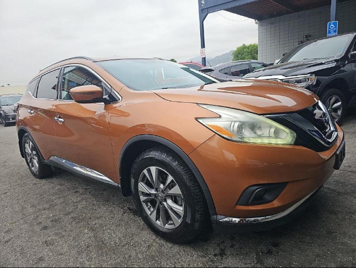 2016 ORANGE Nissan Murano (5N1AZ2MG9GN) with an V6 3.5 Liter engine, Automatic Xtronic CVT transmission, located at 412 Auto Vista Drive, Palmdale, 93551, (661) 945-0620, 34.592636, -118.136681 - Photo#1
