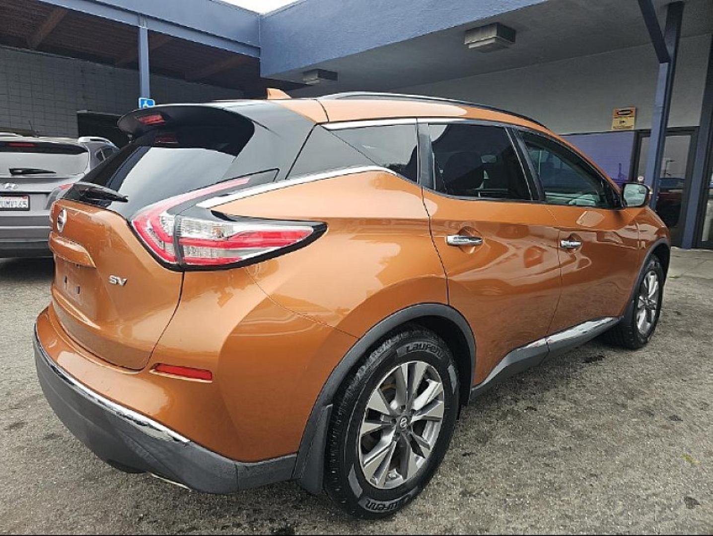 2016 ORANGE Nissan Murano (5N1AZ2MG9GN) with an V6 3.5 Liter engine, Automatic Xtronic CVT transmission, located at 412 Auto Vista Drive, Palmdale, 93551, (661) 945-0620, 34.592636, -118.136681 - Photo#2
