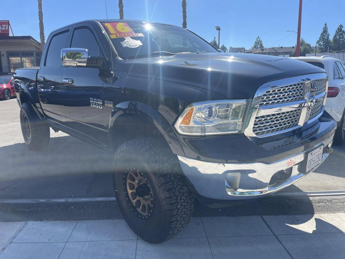 2016 RAM 1500 Laramie Crew Cab SWB 4WD (1C6RR7NT8GS) with an 5.7L V8 OHV 16V engine, 6A transmission, located at 744 E Miner Ave, Stockton, CA, 95202, (209) 944-5770, 37.956863, -121.282082 - PLUS TAXES AND FEES - Photo#1