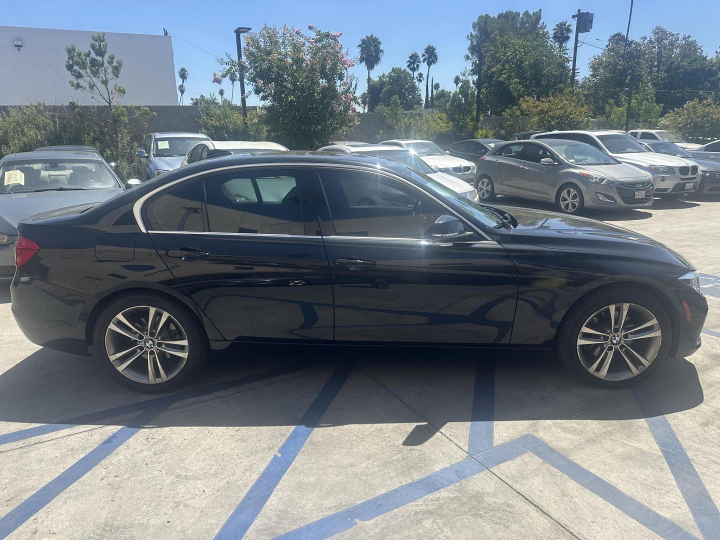 2017 Gray /Black BMW 3-Series 330i SULEV Sedan (WBA8B9G37HN) with an 3.0L L6 DOHC 24V engine, 8A transmission, located at 30 S. Berkeley Avenue, Pasadena, CA, 91107, (626) 248-7567, 34.145447, -118.109398 - Navigation! Leather seats! This 2017 BMW 3-Series 330i SULEV Sedan looks and drives well. Bad credit? We can help! We are the bank. Bad Credit? We can help! We are the bank. All our cars are thoroughly inspected and reconditioned by our technicians. FREE CARFAX report. Stop by or call to speak with - Photo#5