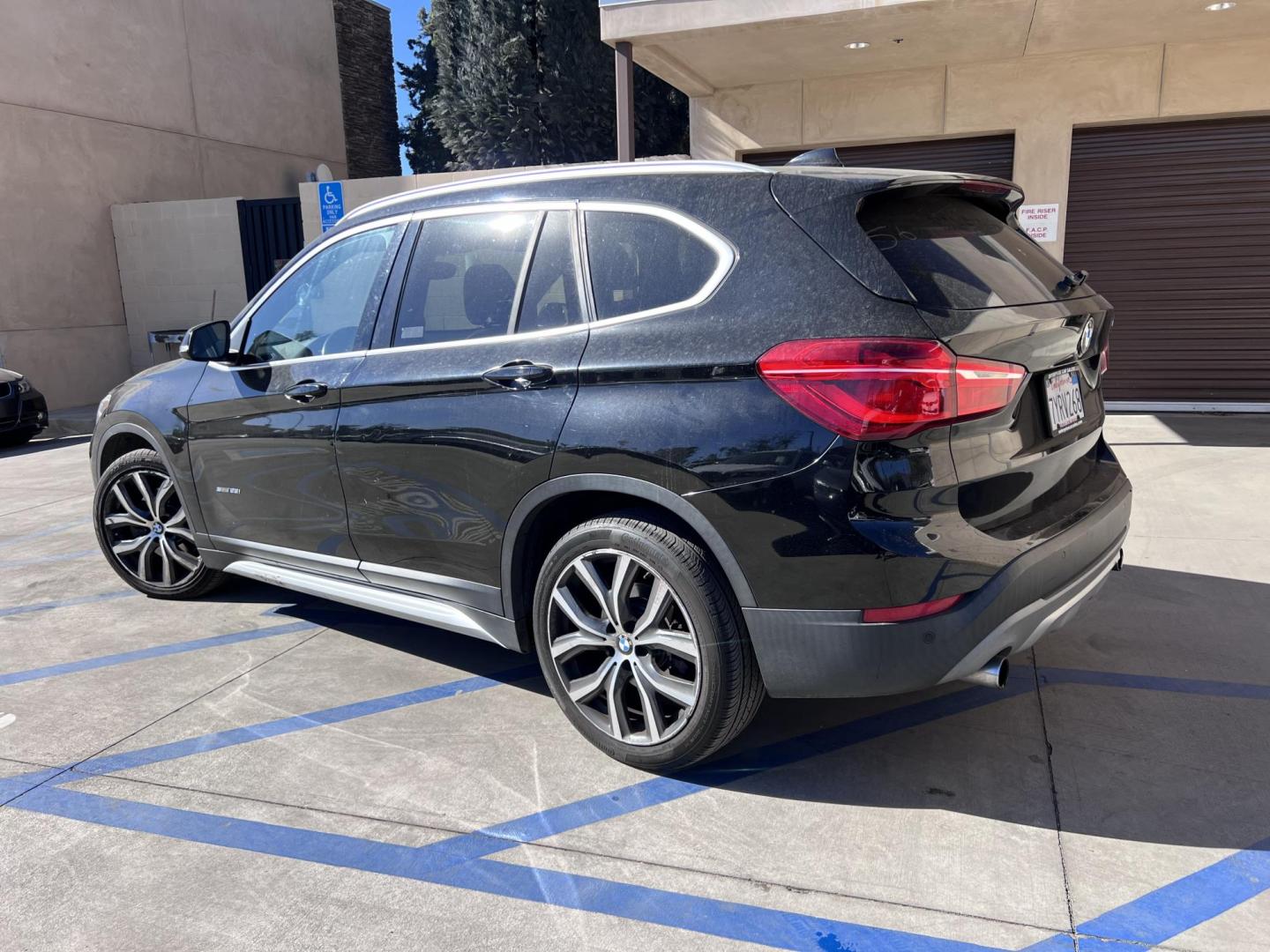 2017 Black /Black BMW X1 sDrive28i (WBXHU7C33H5) with an 2.0L L4 DOHC 16V engine, 8A transmission, located at 30 S. Berkeley Avenue, Pasadena, CA, 91107, (626) 248-7567, 34.145447, -118.109398 - Experience the pinnacle of luxury and versatility with the 2017 BMW X1, a compact SUV that delivers style, performance, and cutting-edge technology in one stunning package. With low miles for its year at just 79,804, this exceptional vehicle offers you an incredible opportunity to drive a nearly new - Photo#2