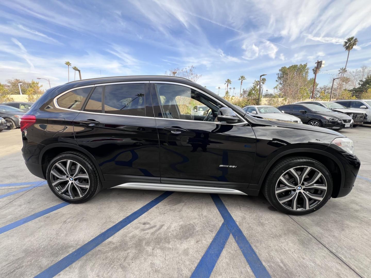 2017 Black /Black BMW X1 sDrive28i (WBXHU7C33H5) with an 2.0L L4 DOHC 16V engine, 8A transmission, located at 30 S. Berkeley Avenue, Pasadena, CA, 91107, (626) 248-7567, 34.145447, -118.109398 - Experience the pinnacle of luxury and versatility with the 2017 BMW X1, a compact SUV that delivers style, performance, and cutting-edge technology in one stunning package. With low miles for its year at just 79,804, this exceptional vehicle offers you an incredible opportunity to drive a nearly new - Photo#7