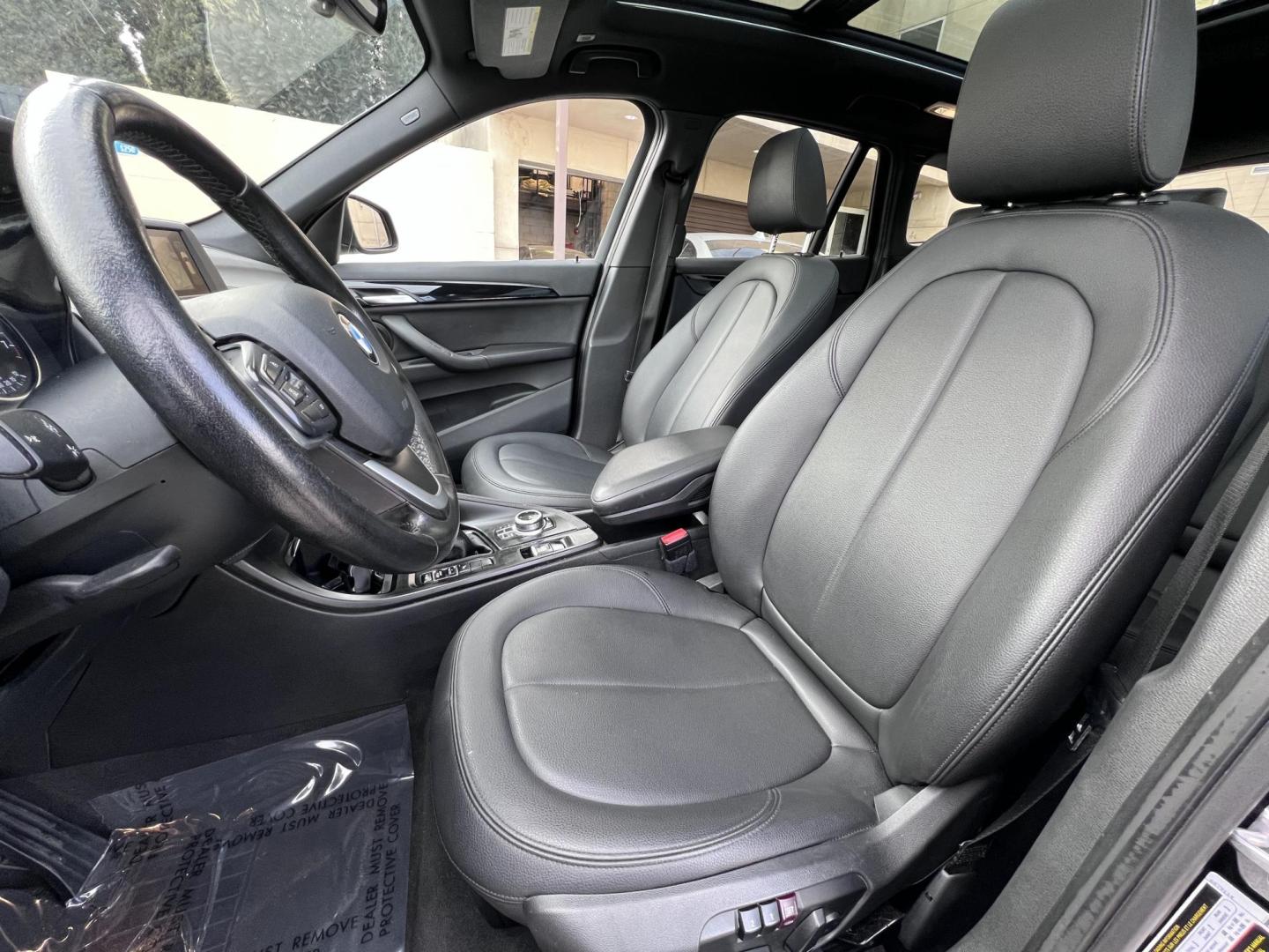 2017 Black /Black BMW X1 sDrive28i (WBXHU7C33H5) with an 2.0L L4 DOHC 16V engine, 8A transmission, located at 30 S. Berkeley Avenue, Pasadena, CA, 91107, (626) 248-7567, 34.145447, -118.109398 - Experience the pinnacle of luxury and versatility with the 2017 BMW X1, a compact SUV that delivers style, performance, and cutting-edge technology in one stunning package. With low miles for its year at just 79,804, this exceptional vehicle offers you an incredible opportunity to drive a nearly new - Photo#9