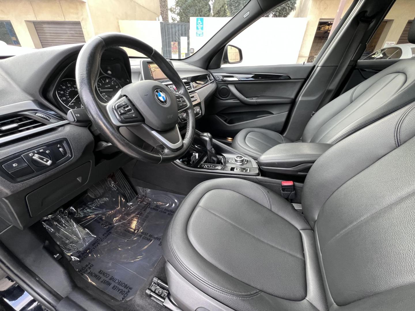 2017 Black /Black BMW X1 sDrive28i (WBXHU7C33H5) with an 2.0L L4 DOHC 16V engine, 8A transmission, located at 30 S. Berkeley Avenue, Pasadena, CA, 91107, (626) 248-7567, 34.145447, -118.109398 - Experience the pinnacle of luxury and versatility with the 2017 BMW X1, a compact SUV that delivers style, performance, and cutting-edge technology in one stunning package. With low miles for its year at just 79,804, this exceptional vehicle offers you an incredible opportunity to drive a nearly new - Photo#10