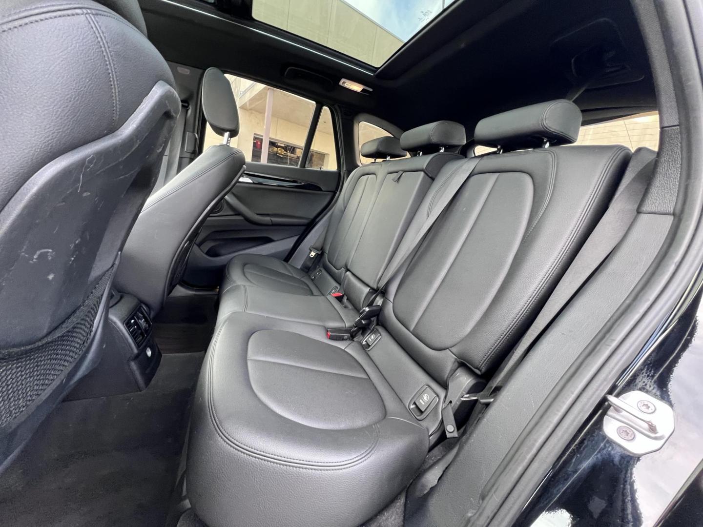 2017 Black /Black BMW X1 sDrive28i (WBXHU7C33H5) with an 2.0L L4 DOHC 16V engine, 8A transmission, located at 30 S. Berkeley Avenue, Pasadena, CA, 91107, (626) 248-7567, 34.145447, -118.109398 - Experience the pinnacle of luxury and versatility with the 2017 BMW X1, a compact SUV that delivers style, performance, and cutting-edge technology in one stunning package. With low miles for its year at just 79,804, this exceptional vehicle offers you an incredible opportunity to drive a nearly new - Photo#12