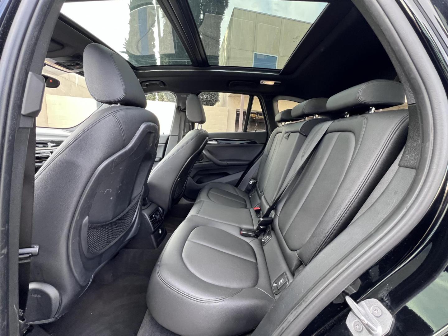 2017 Black /Black BMW X1 sDrive28i (WBXHU7C33H5) with an 2.0L L4 DOHC 16V engine, 8A transmission, located at 30 S. Berkeley Avenue, Pasadena, CA, 91107, (626) 248-7567, 34.145447, -118.109398 - Experience the pinnacle of luxury and versatility with the 2017 BMW X1, a compact SUV that delivers style, performance, and cutting-edge technology in one stunning package. With low miles for its year at just 79,804, this exceptional vehicle offers you an incredible opportunity to drive a nearly new - Photo#13