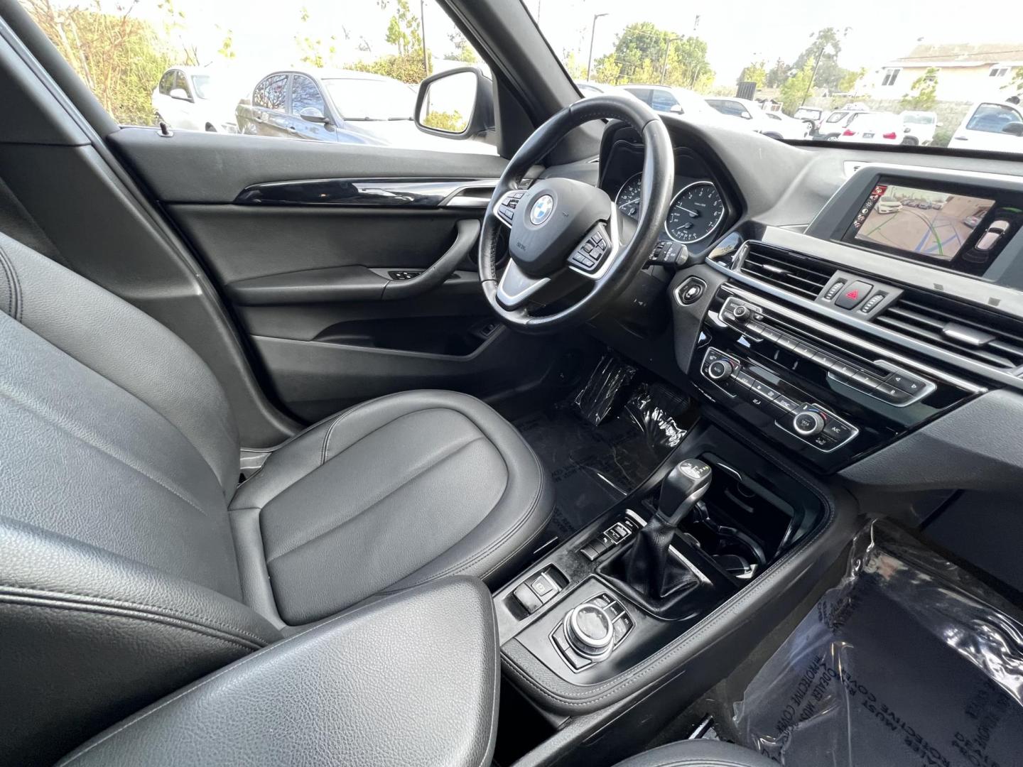 2017 Black /Black BMW X1 sDrive28i (WBXHU7C33H5) with an 2.0L L4 DOHC 16V engine, 8A transmission, located at 30 S. Berkeley Avenue, Pasadena, CA, 91107, (626) 248-7567, 34.145447, -118.109398 - Experience the pinnacle of luxury and versatility with the 2017 BMW X1, a compact SUV that delivers style, performance, and cutting-edge technology in one stunning package. With low miles for its year at just 79,804, this exceptional vehicle offers you an incredible opportunity to drive a nearly new - Photo#18
