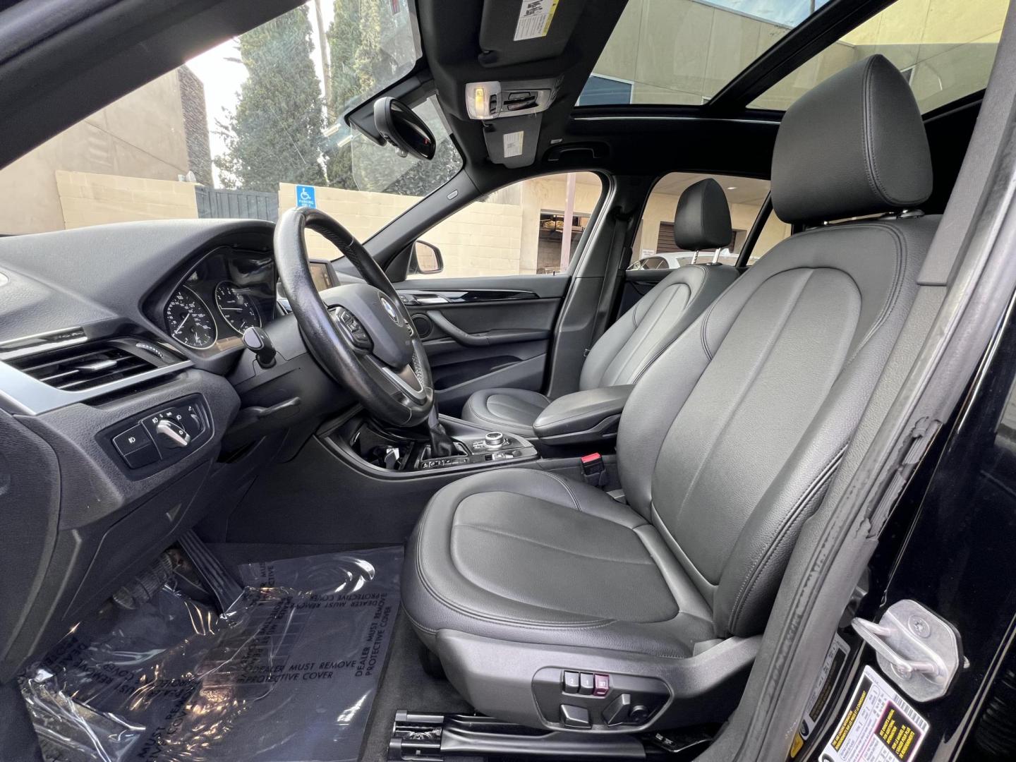 2017 Black /Black BMW X1 sDrive28i (WBXHU7C33H5) with an 2.0L L4 DOHC 16V engine, 8A transmission, located at 30 S. Berkeley Avenue, Pasadena, CA, 91107, (626) 248-7567, 34.145447, -118.109398 - Experience the pinnacle of luxury and versatility with the 2017 BMW X1, a compact SUV that delivers style, performance, and cutting-edge technology in one stunning package. With low miles for its year at just 79,804, this exceptional vehicle offers you an incredible opportunity to drive a nearly new - Photo#29